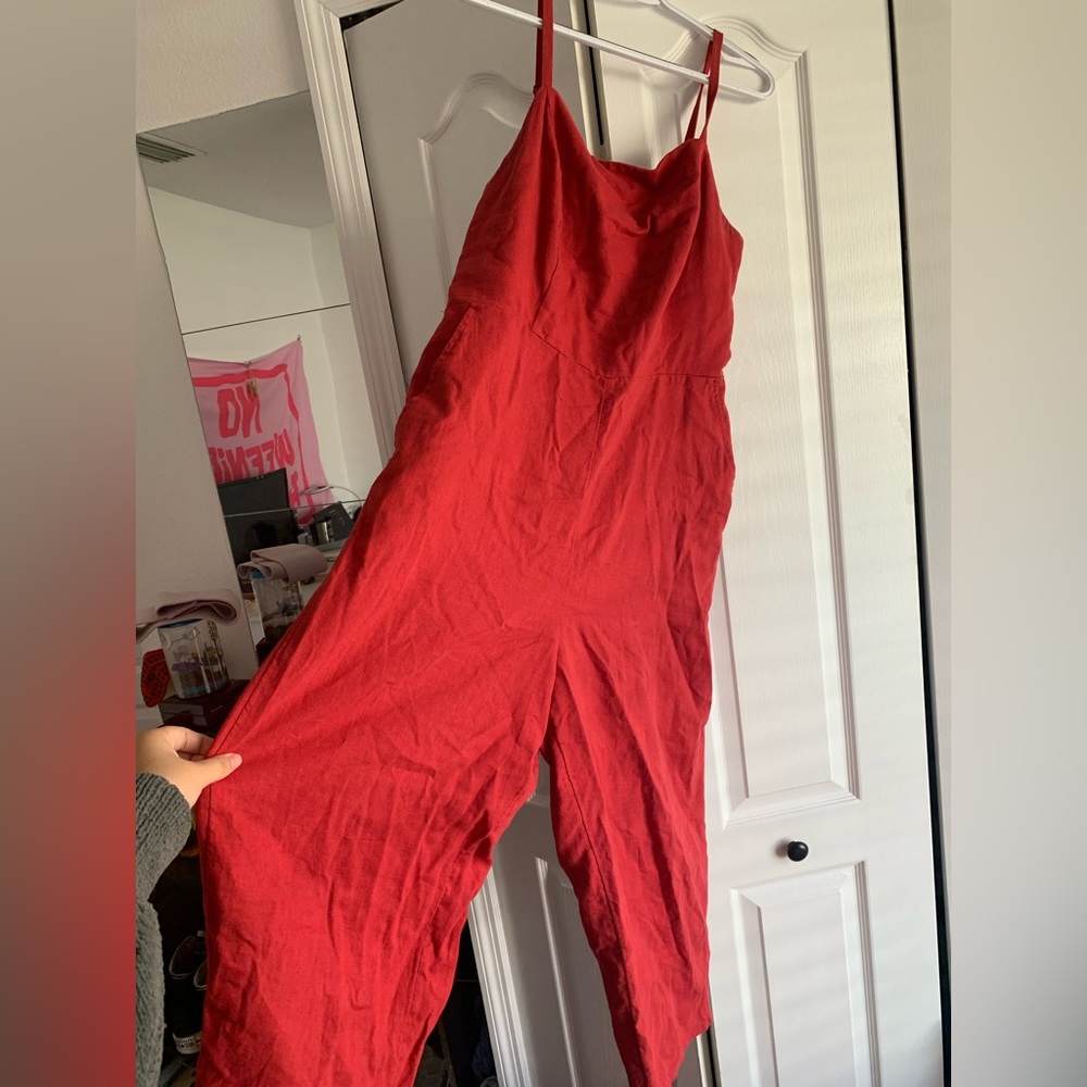 red jumpsuit romper with elastic back and pockets